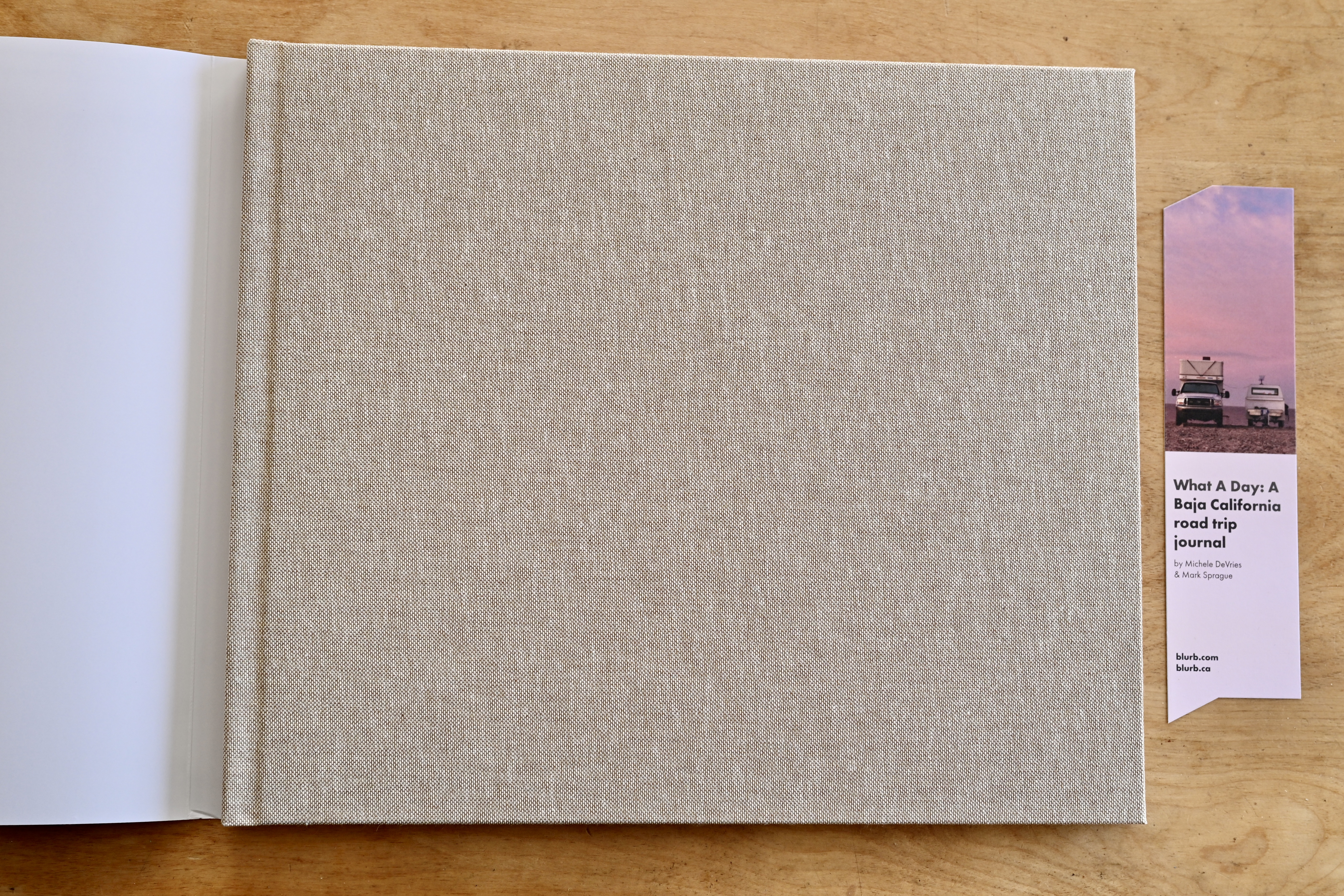 Blurb 11x13, hardcover dustjacket with oatmeal linen cover, grey endsheets, and Mohawk proPhoto Pearl (140# Mohawk Photo Gloss, 190 GSM)