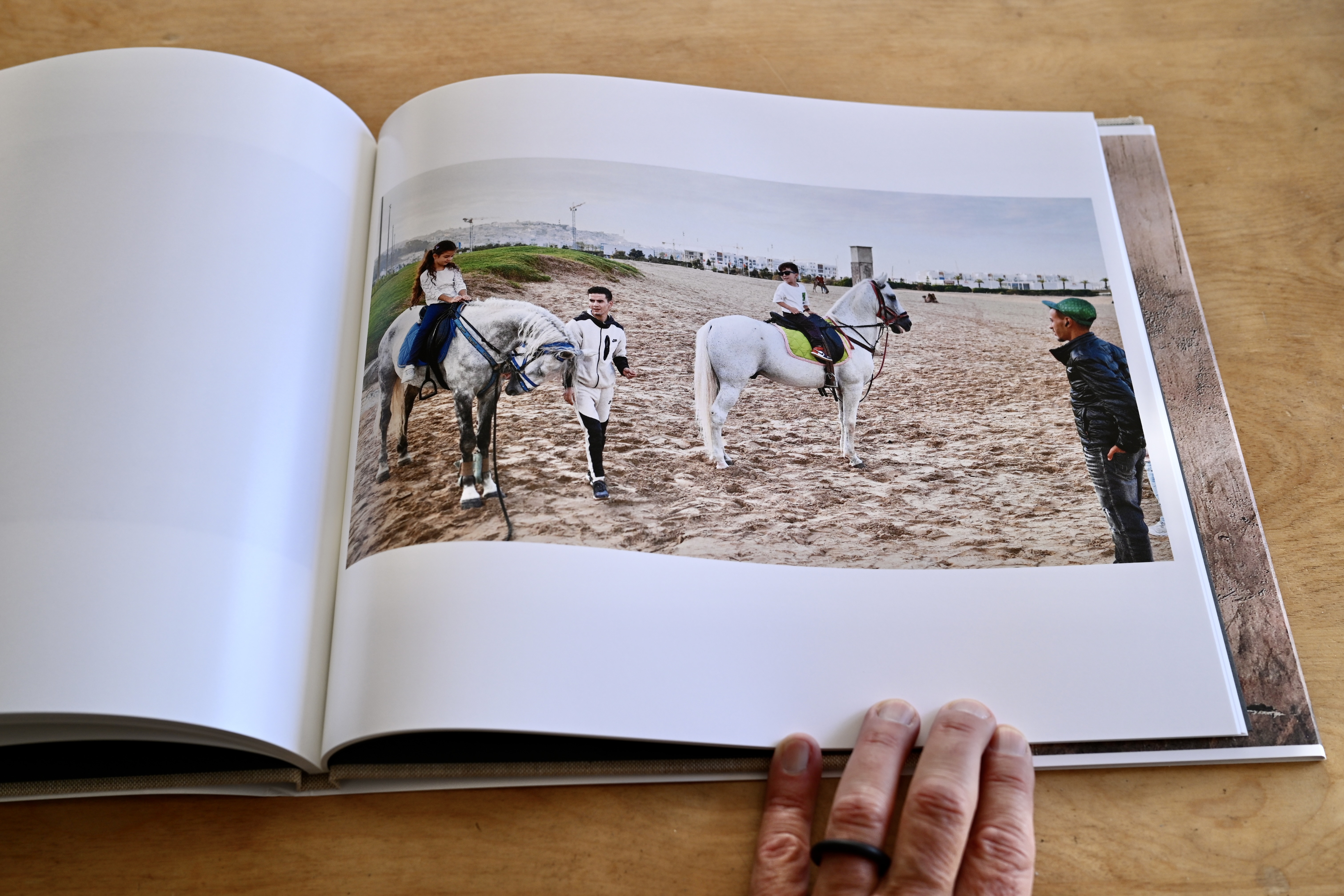 Blurb 11x13, hardcover dustjacket with oatmeal linen cover, grey endsheets, and Mohawk proPhoto Pearl (140# Mohawk Photo Gloss, 190 GSM)
